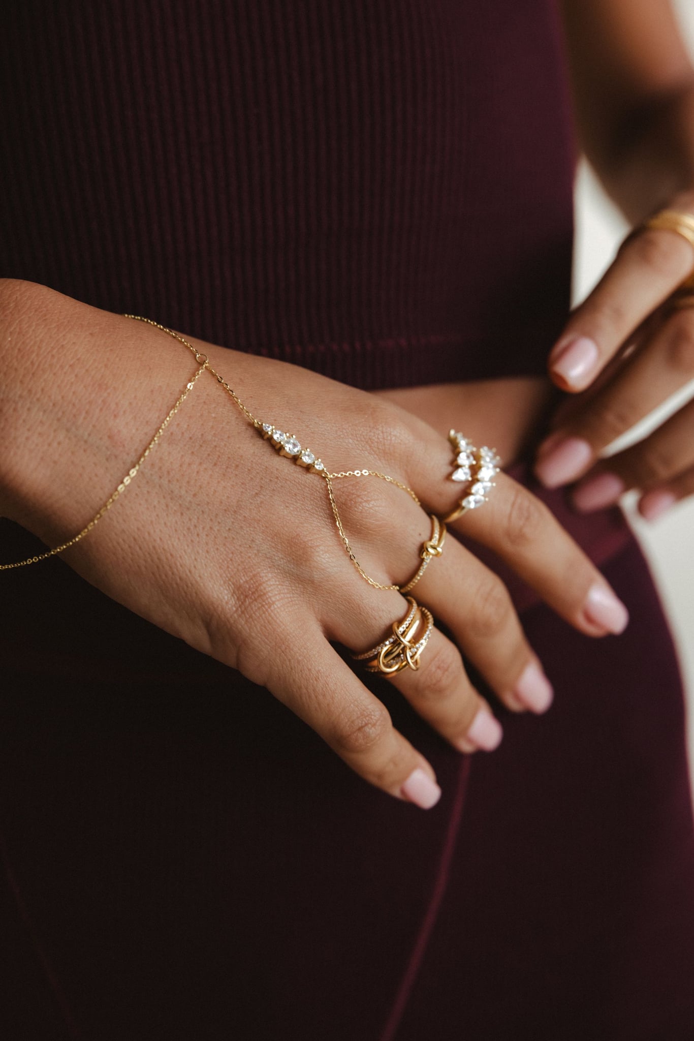Amira hand chain in 18k gold-plated sterling silver with a line of clear stones, view 3 of 5