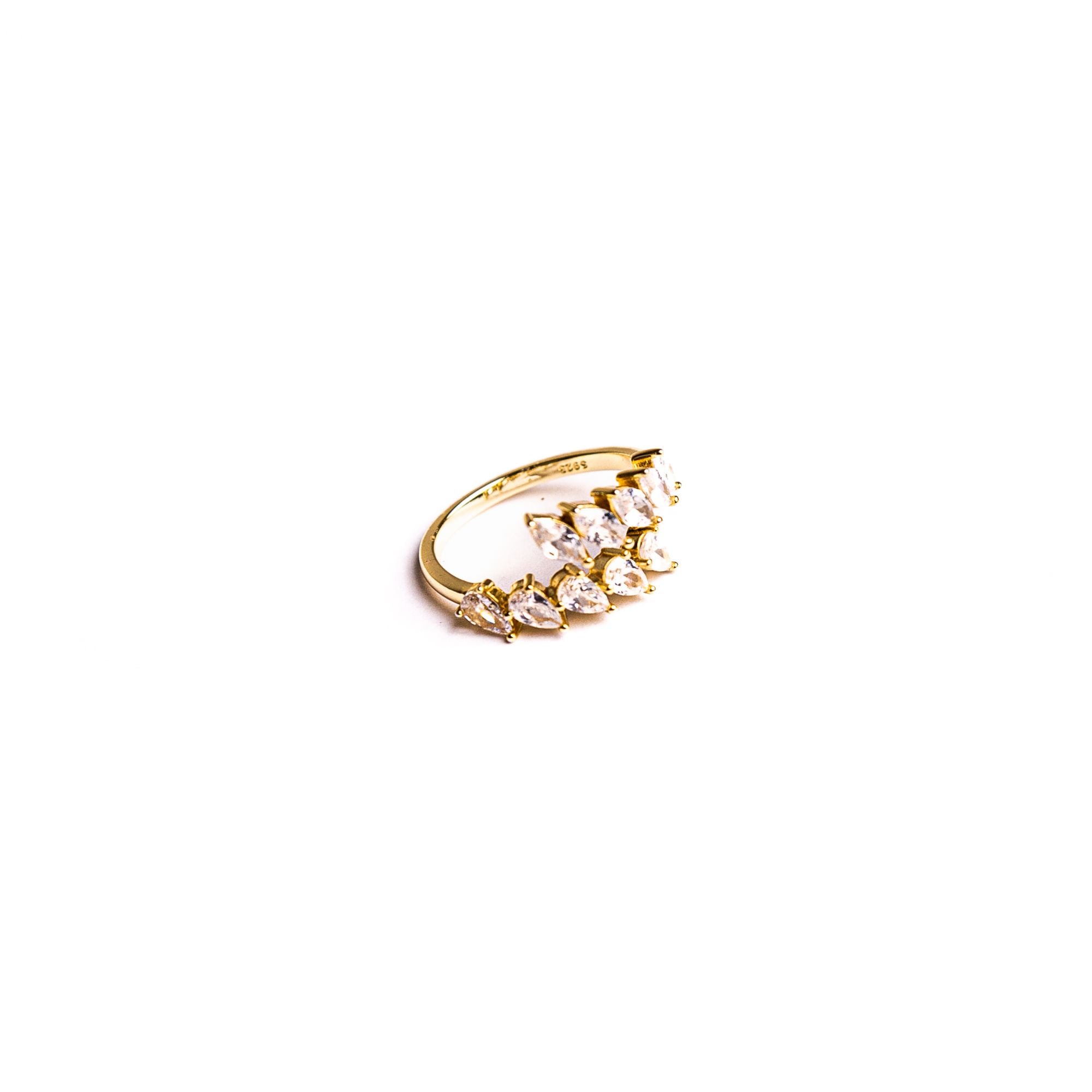 Chrissy ring on a white background: marquise-cut stones opening like petals.