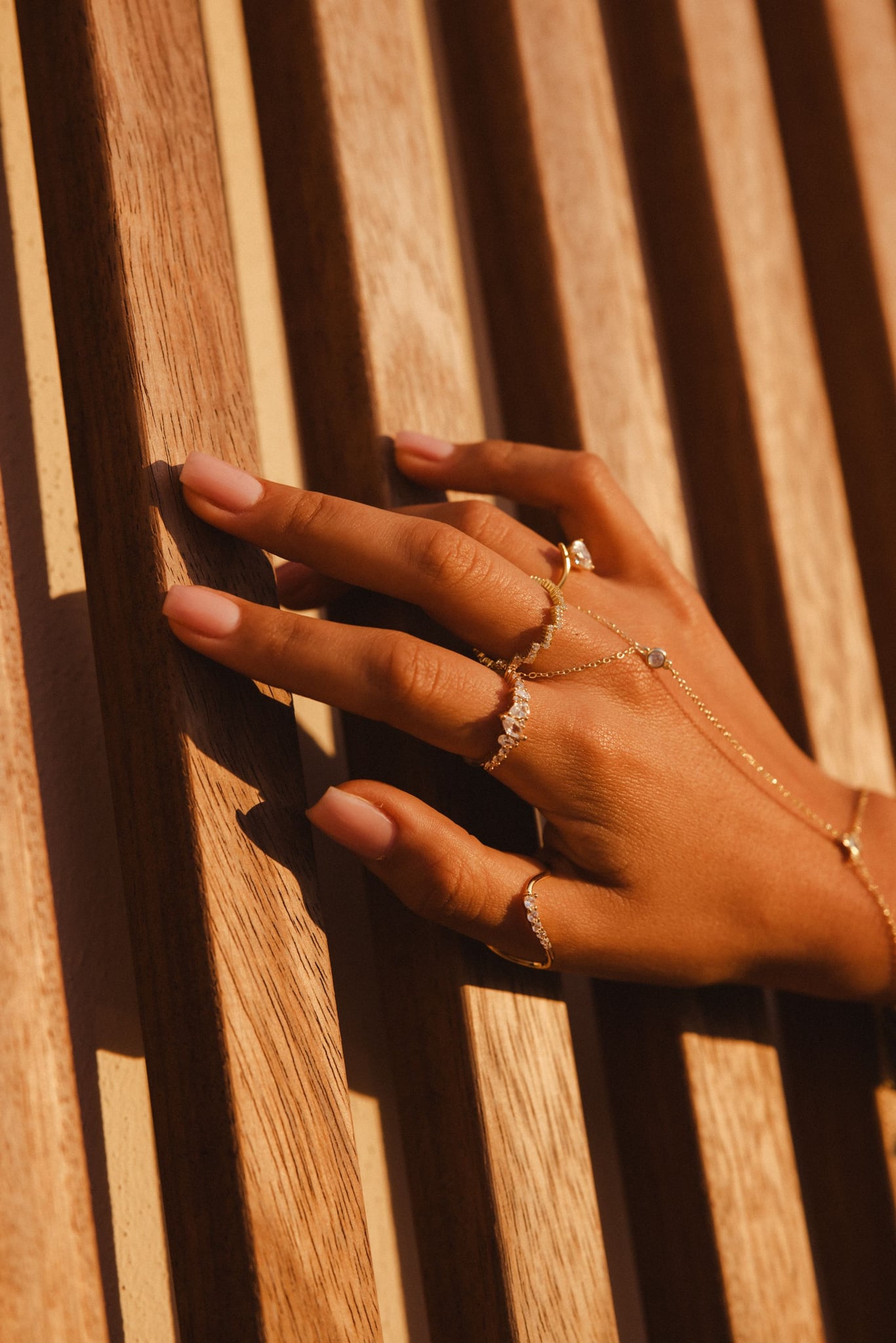 Lailah station hand chain, 18k gold-plated sterling silver with cubic zirconia spaced along the chain, view 5 of 5