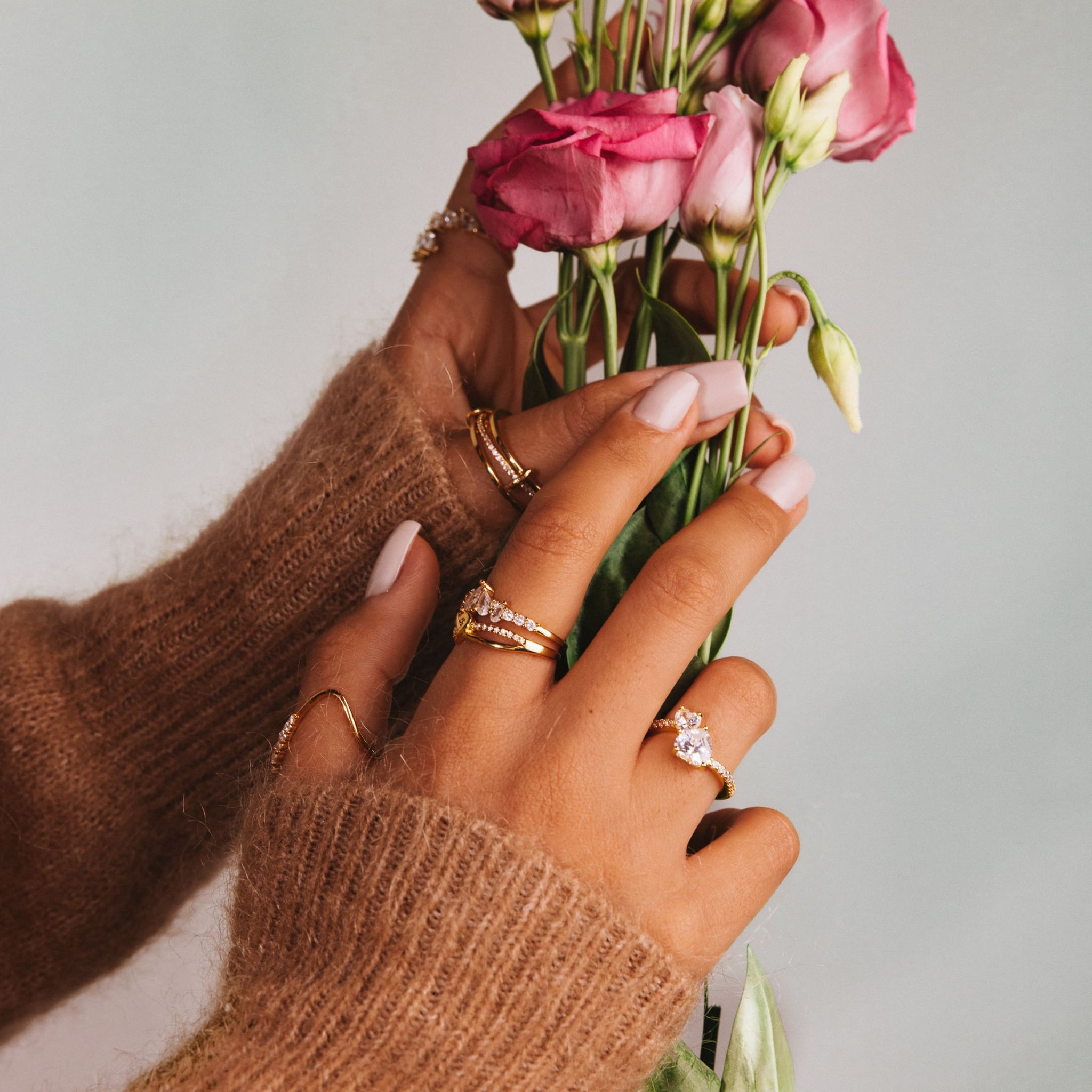 Ume two-stone toi et moi ring in 18k gold-plated sterling silver with two clear stones on a pavé band, view 4 of 6