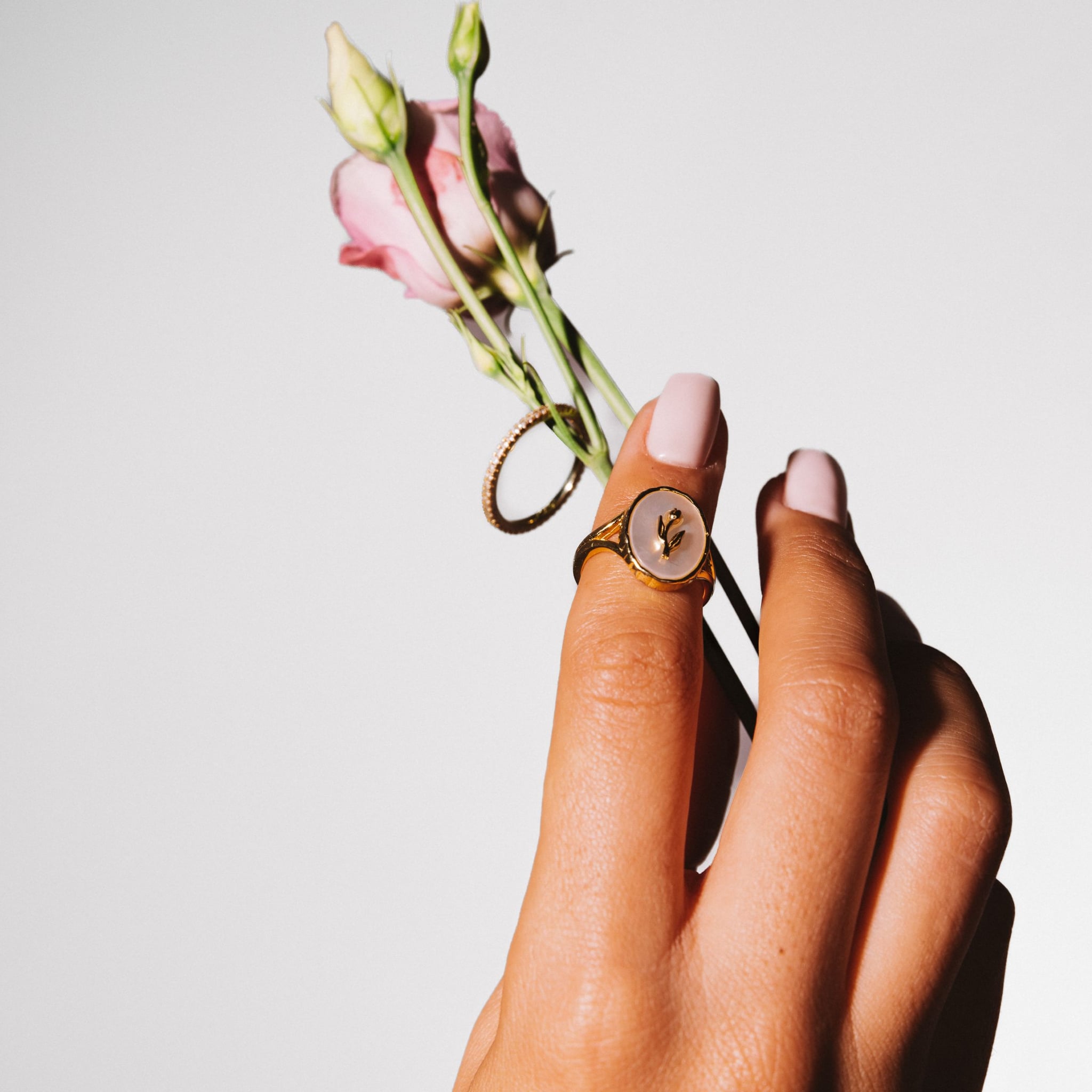 Zahra adjustable flower signet ring, 18k gold-plated sterling silver with a raised tulip on a white face, view 5 of 6